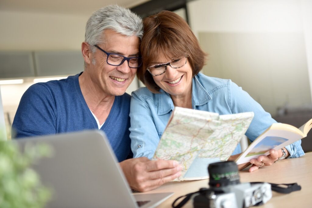 Senior couple preparing vacation trip